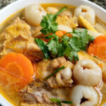 Gà nấu trái vải